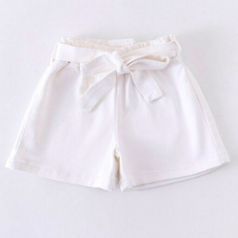 White shorts new in bag